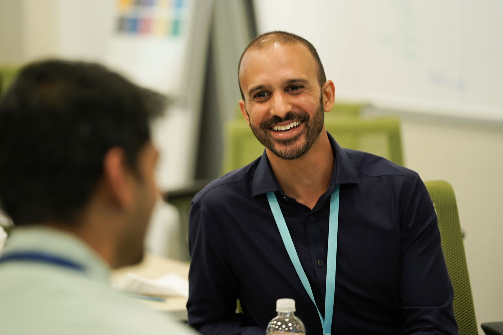 Nasser Qadri in conversation at a workshop